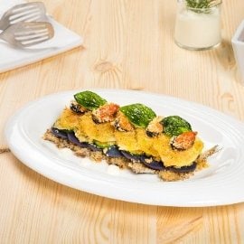 Millefoglie gratin di alici, cozze, zucchine e patate viola