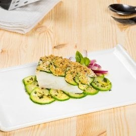 Trancio di merluzzo con zucchine alla mediterranea Trancio di merluzzo con zucchine alla mediterranea