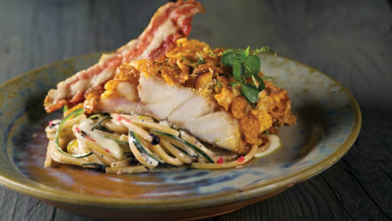 Branzino in crosta di patate e corn flakes su spaghetti integrali alla carbonara di wasabi – - Ricetta