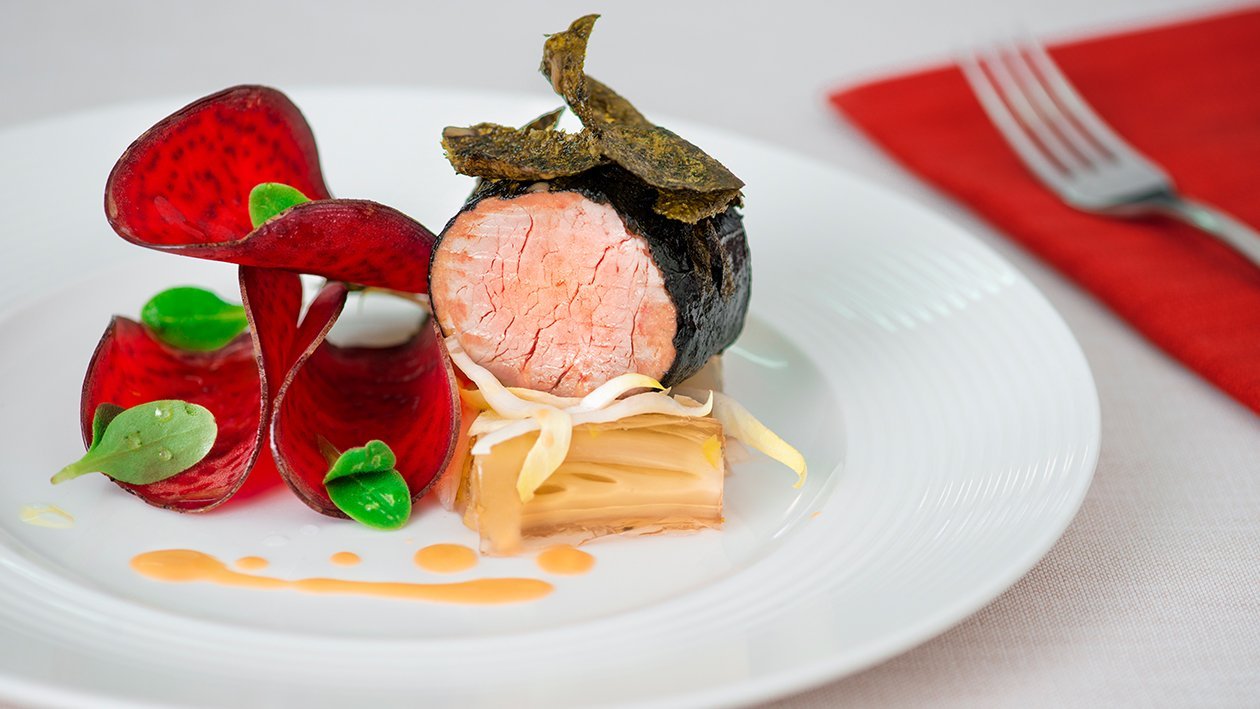 Filetto di maiale in crosta di alga nori con terrina di indivia belga – - Ricetta
