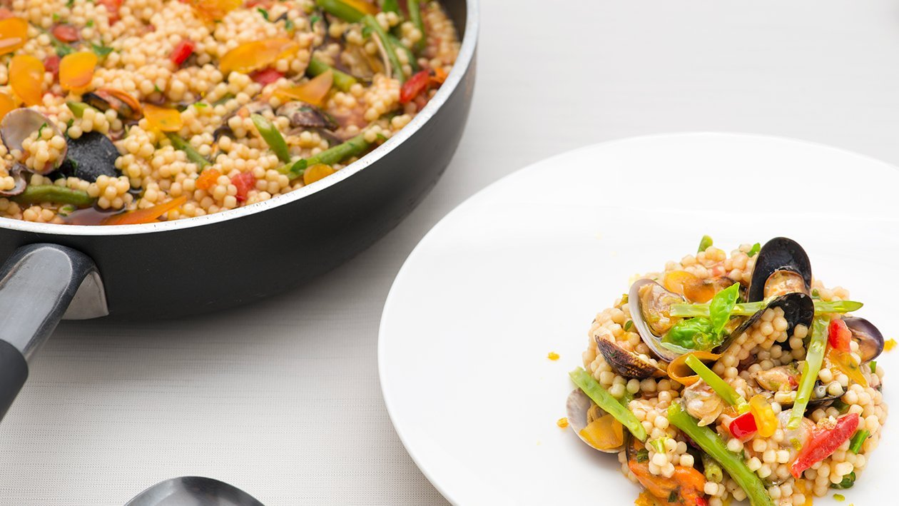 Fregula sarda con frutti di mare, fagiolini e bottarga di muggine – - Ricetta