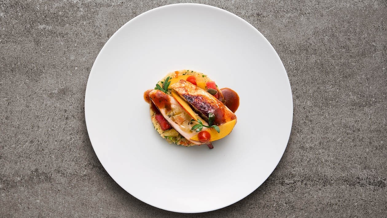 Galletto alla diavola farcito con albicocche su tortino di cous cous agli agrumi – - Ricetta