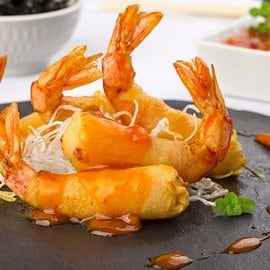 Gamberoni in tempura all'arancia in salsa agrodolce Gamberoni in tempura all'arancia in salsa agrodolce