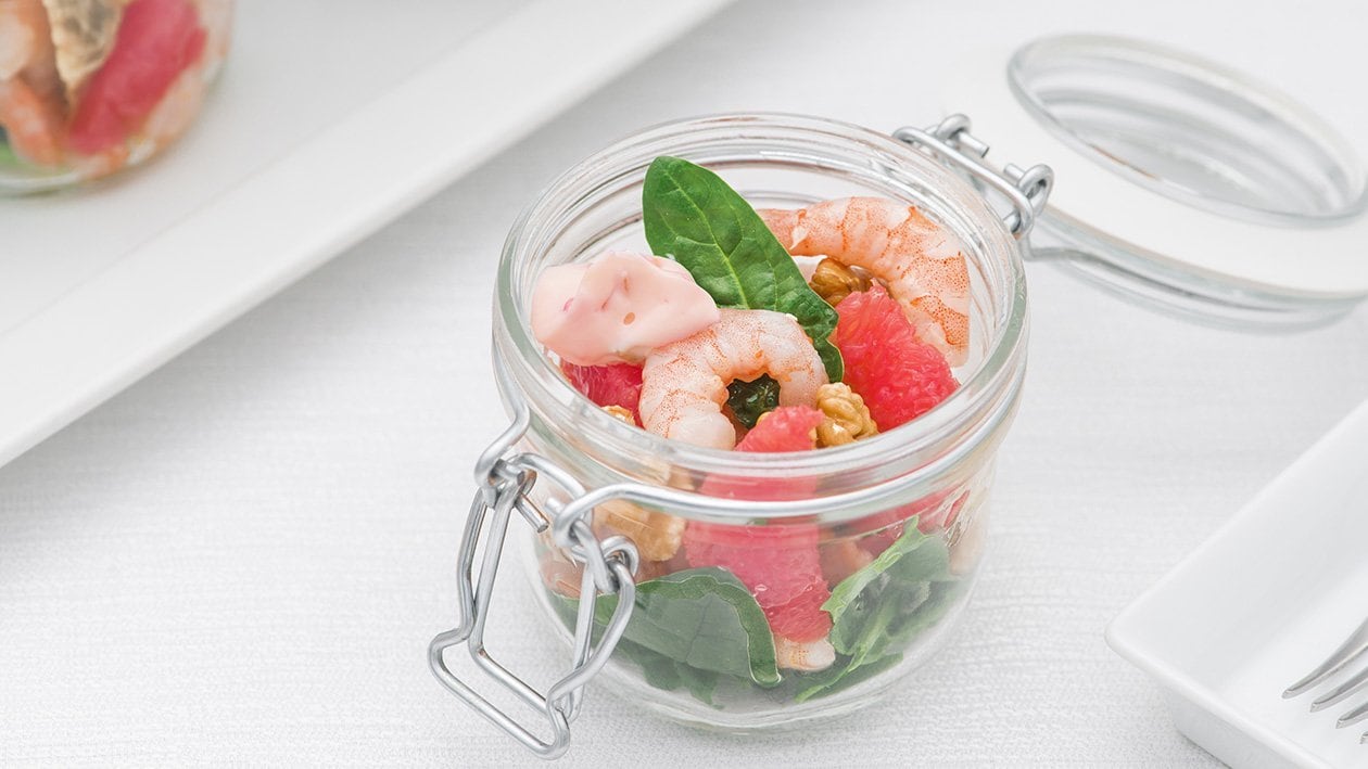 Insalata di gamberi con carciofi al basilico, foglie di spinaci, pompelmo rosa e noci – - Ricetta