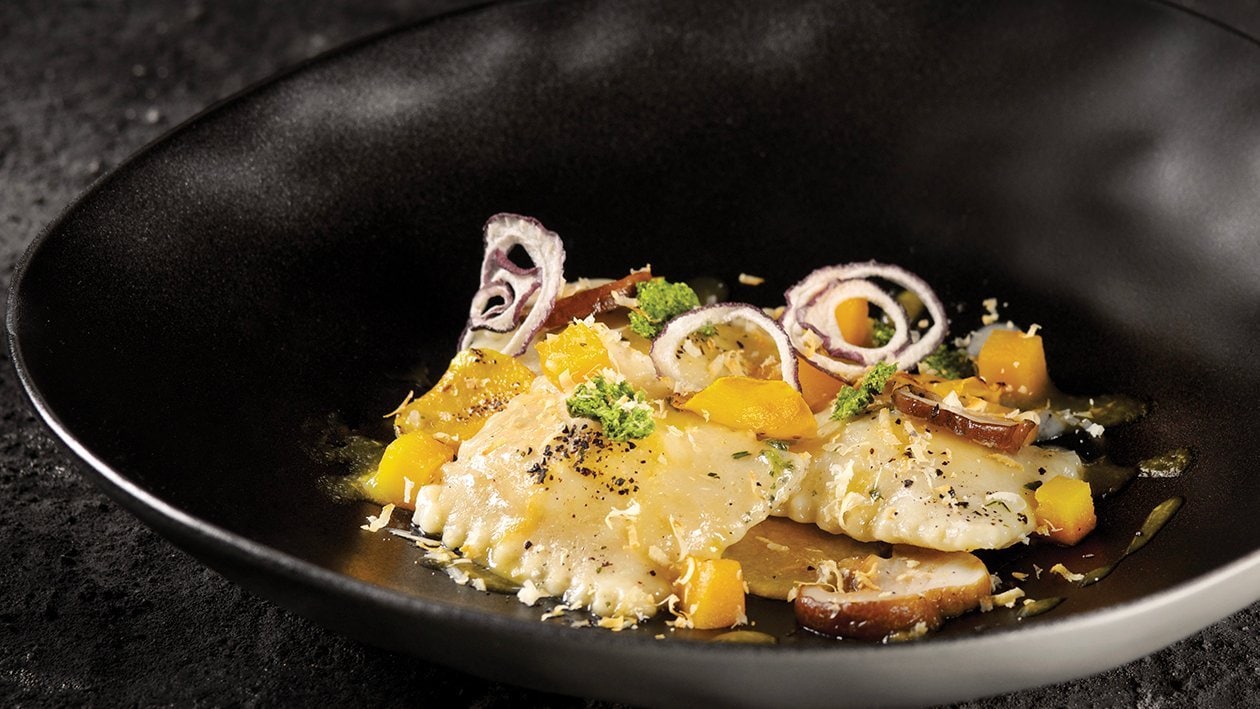 Ravioli di ricotta affumicata con zucca gialla, funghi porcini e rosmarino – - Ricetta