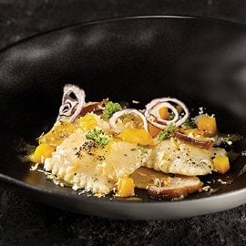 Ravioli di ricotta affumicata con zucca gialla, funghi porcini e rosmarino Ravioli di ricotta affumicata con zucca gialla, funghi porcini e rosmarino