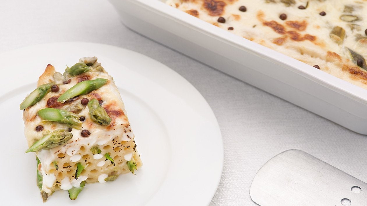 Timballo di ziti con asparagi, taleggio e salsa bianca al pepe rosa – - Ricetta