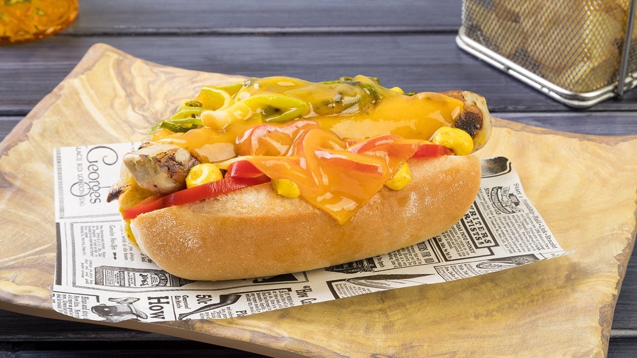 Hot dog con peperoni pequillo, cipollotto verde brasato, cheddar e senape gialla – - Ricetta